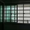 Service yard sliding window