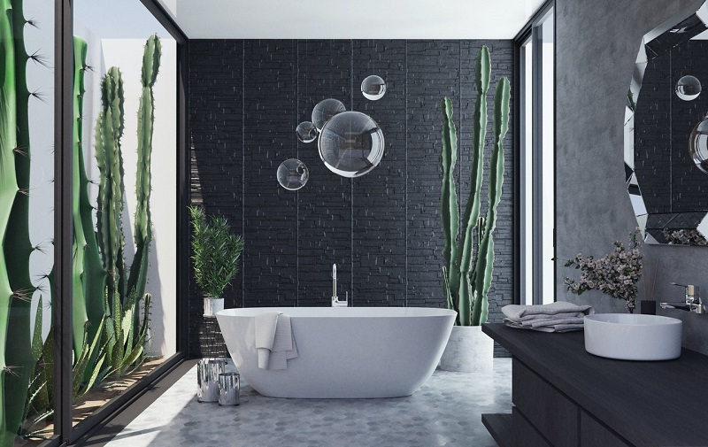 A staged bathroom with plants